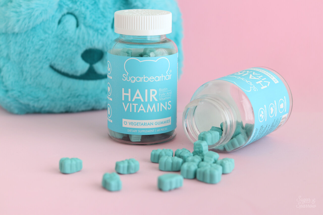 Clean product shot of SugarBearHair vitamin bottles.